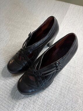 Indigo Black Leather Button-Detail Heels